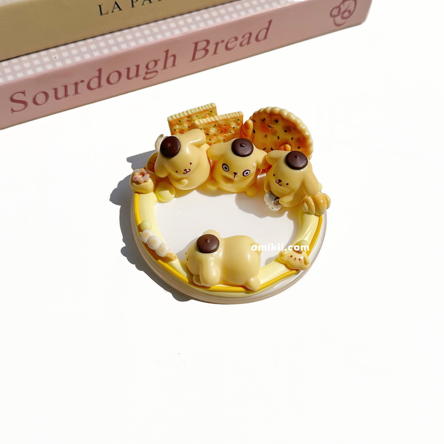 Sanrio Myaweetpiamo and Pompom Purin phone stand