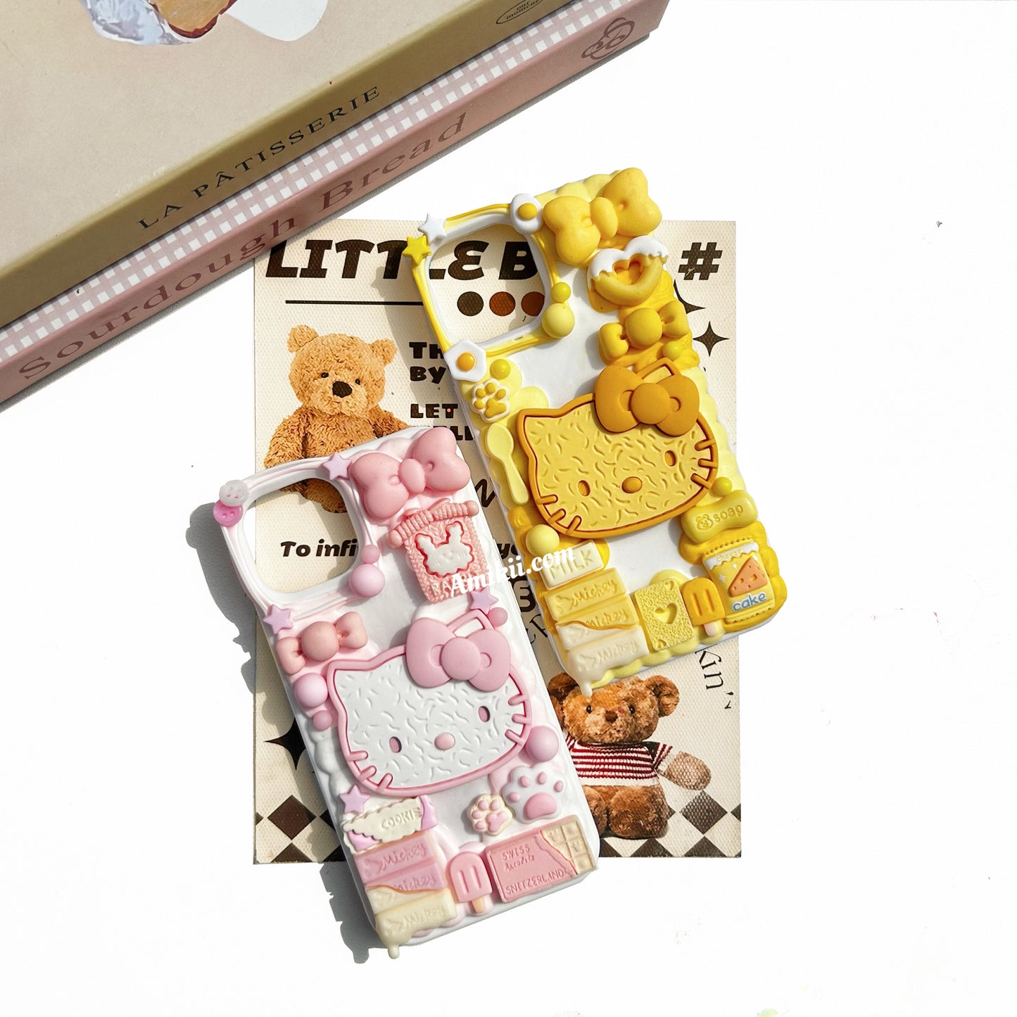 黄色とピンクのHello KTクッキー携帯ケース